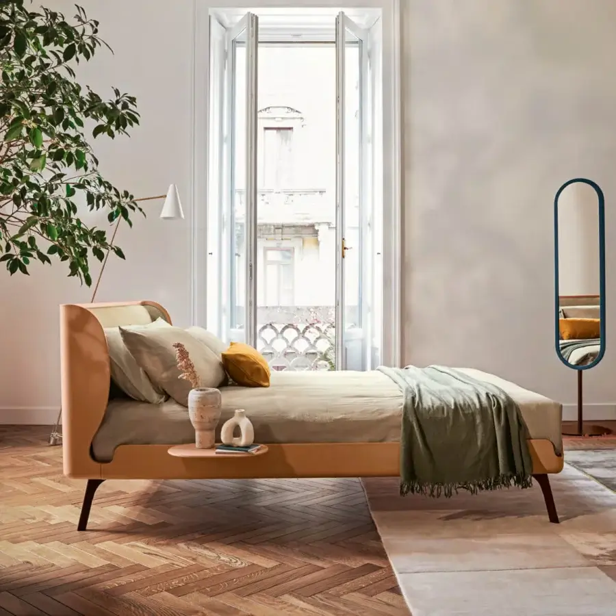 Distinguished Bolzan Letti Gabri bed with enveloping headboard and dark brown tapered legs crafted in Italy with beige textile upholstery