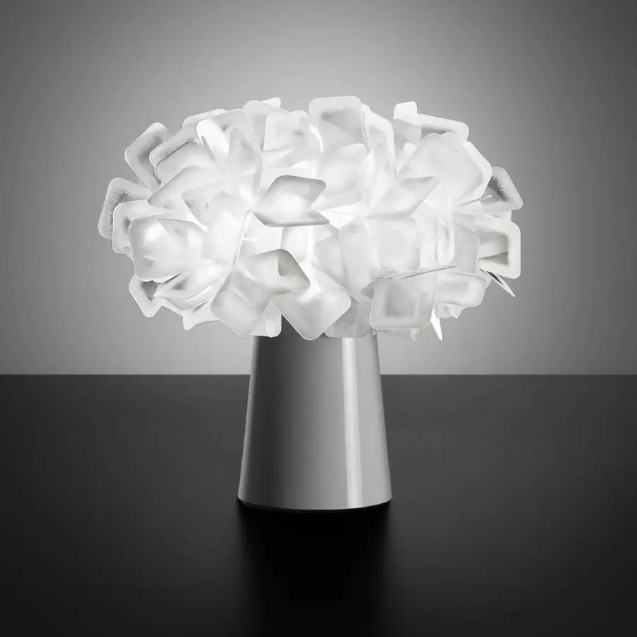 Captivating Slamp Clizia table lamp crafted in translucent Lentiflex® with a neutral white, irregular lampshade and glossy base