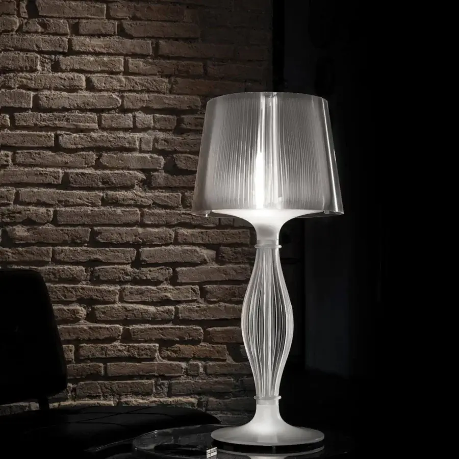 Superior Slamp Liza table lamp with translucent techno-polymer shade and base exhibiting ribbed detailing