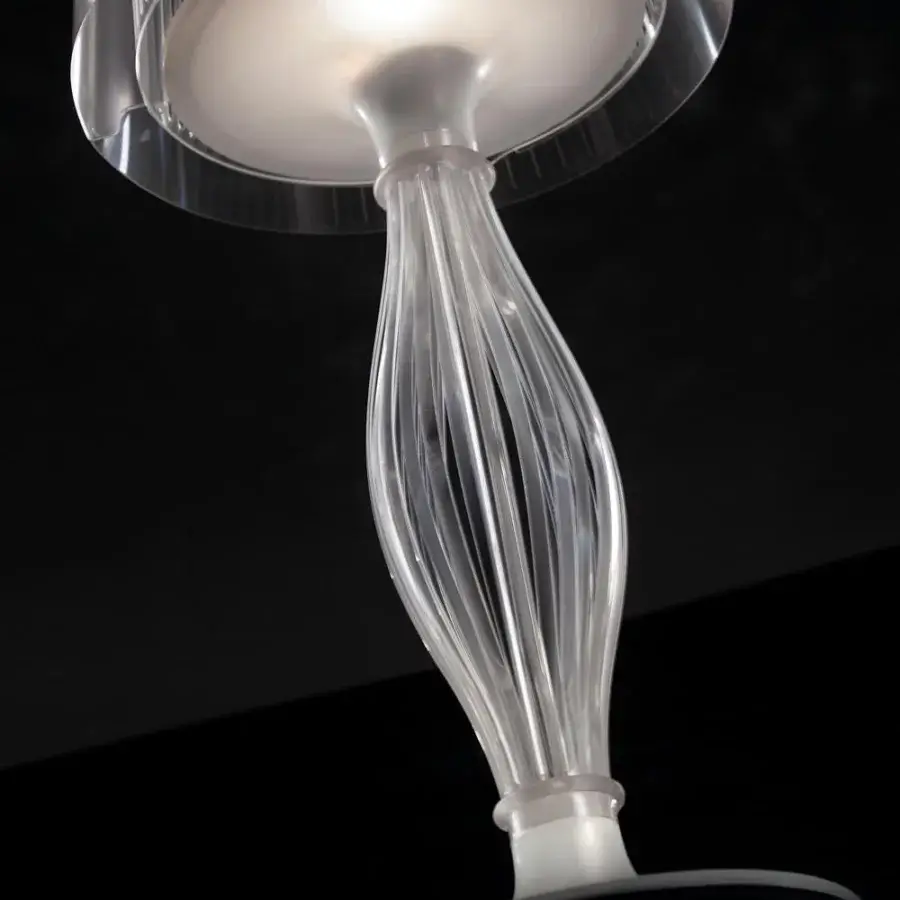 Exclusive Slamp Liza table lamp crafted in transparent techno-polymer with Prisma finish exhibiting baroque inspiration