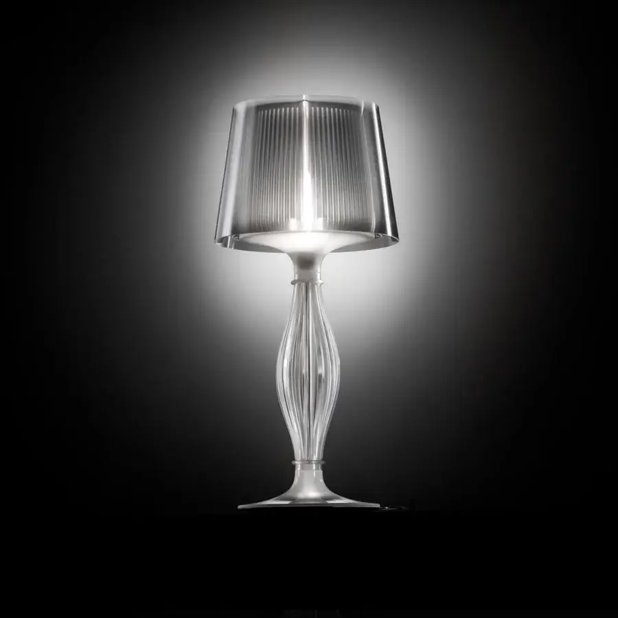 Distinguished Slamp Liza table lamp with baroque inspiration crafted in clear techno-polymer with glossy finish