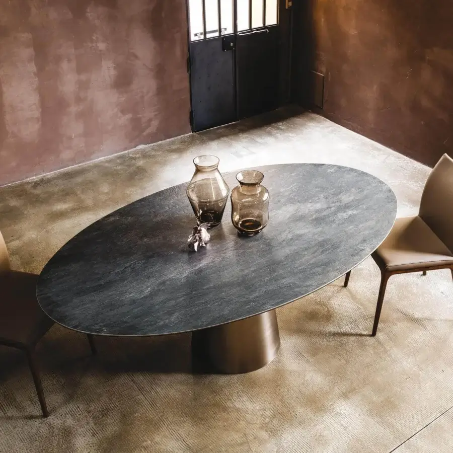 Exceptional Cattelan Italia Yoda table with Ardesia ceramic top and satin titanium steel cylindrical base crafted with luxury glazes