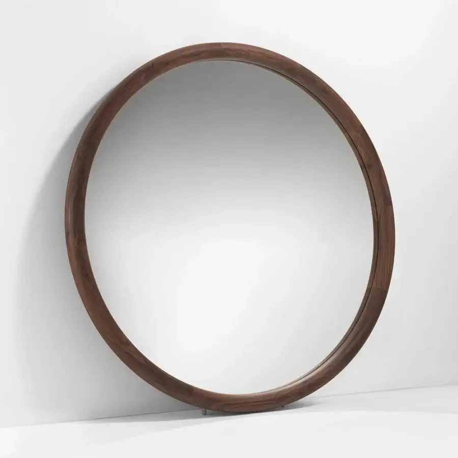 Distinguished Porada Giove mirror with circular reflective surface and smooth dark brown Canaletto walnut frame