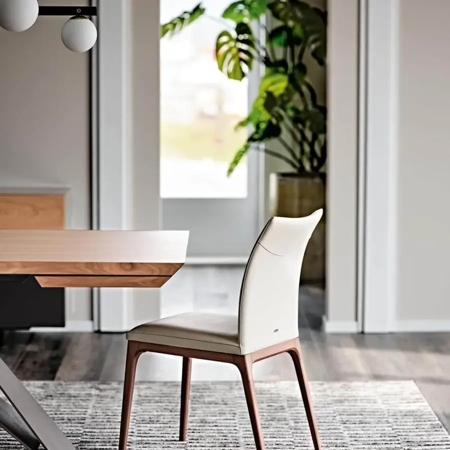 Lavish Cattelan Italia Arcadia chair in light beige leather with wengè-stained beech support crafted with curved lines and subtle stitching