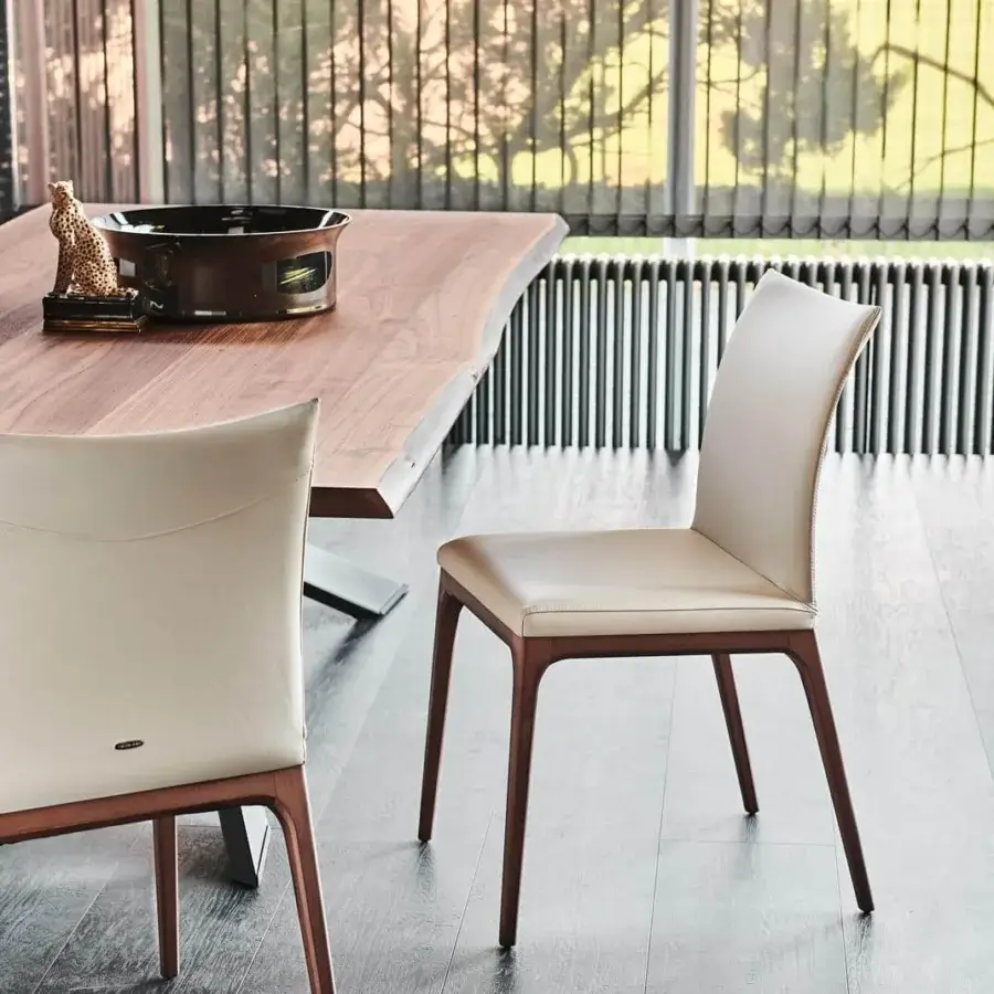 Distinguished Cattelan Italia Arcadia chair in light beige material with wengè-stained beechwood frame offering a contemporary aesthetic