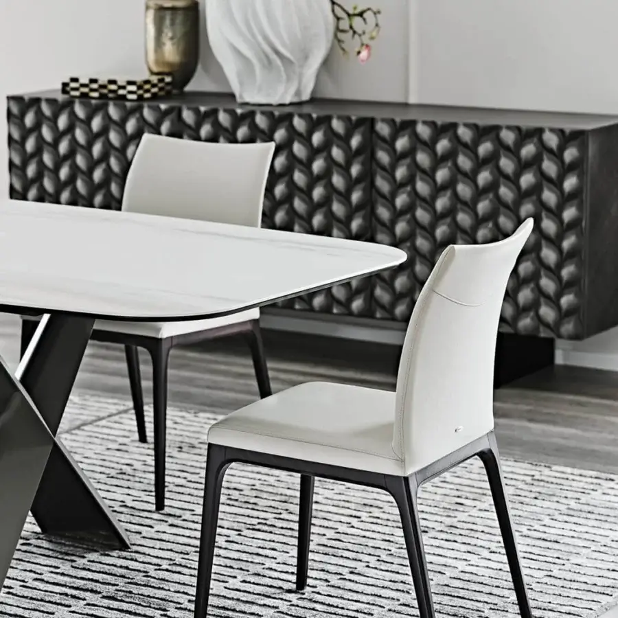 Superior Cattelan Italia Arcadia chair with curved back and dark-stained beech, upholstered in smooth white synthetic leather