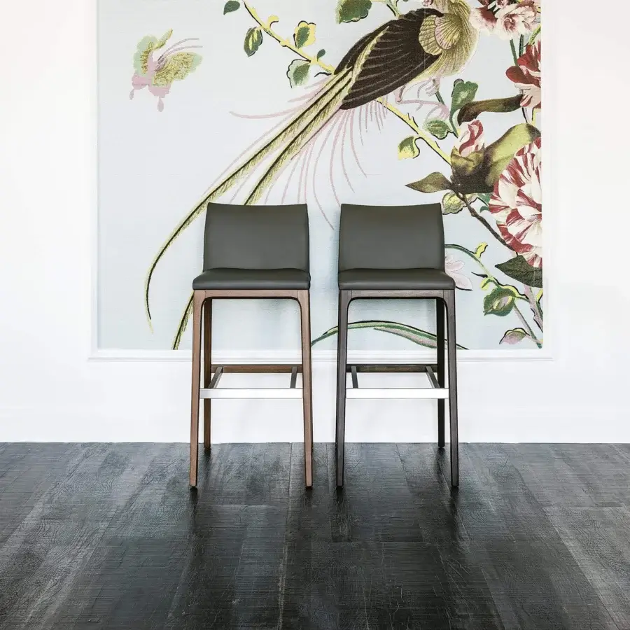 Exceptional Cattelan Italia Arcadia stool with wengè-stained beech frame and dark gray synthetic leather seat built with a metallic footrest