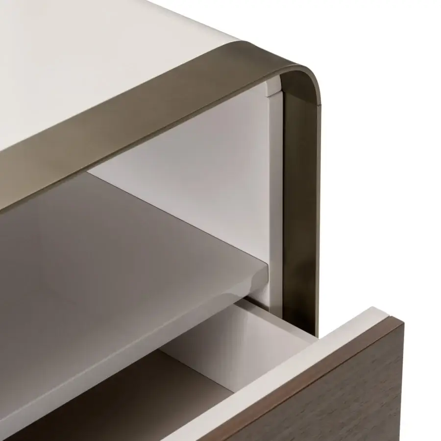 Superior Turri Soul dresser with rounded silhouette, glossy lacquer and bronze-toned metal frame built with a wood-grained drawer front