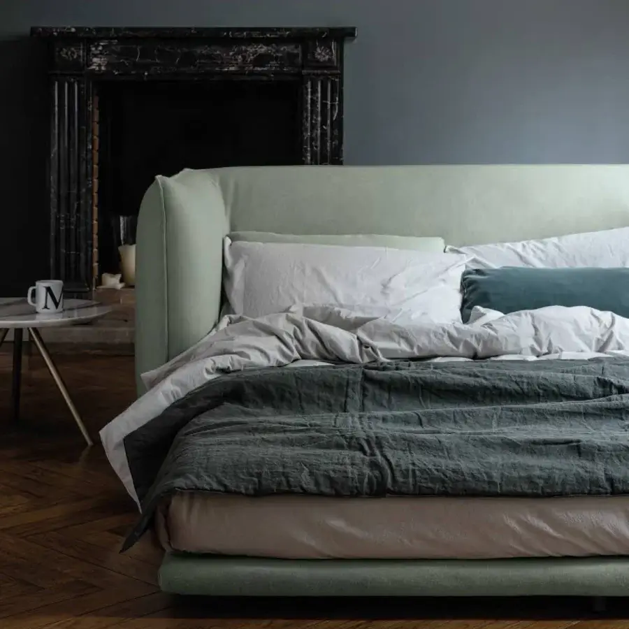 Sumptuous Bolzan Letti Jill daybed crafted in Italy with muted green textile upholstery and matte finish firwood structure
