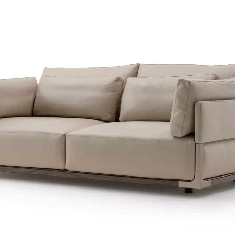 Exclusive Turri Drum sofa with smooth matte beige leather upholstery and striking walnut wood with metal accents