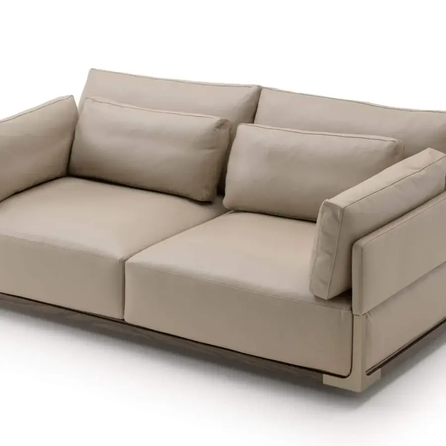 Lavish Turri Drum sofa with comfortable seating upholstered in light beige leather or fabric and walnut wood structure
