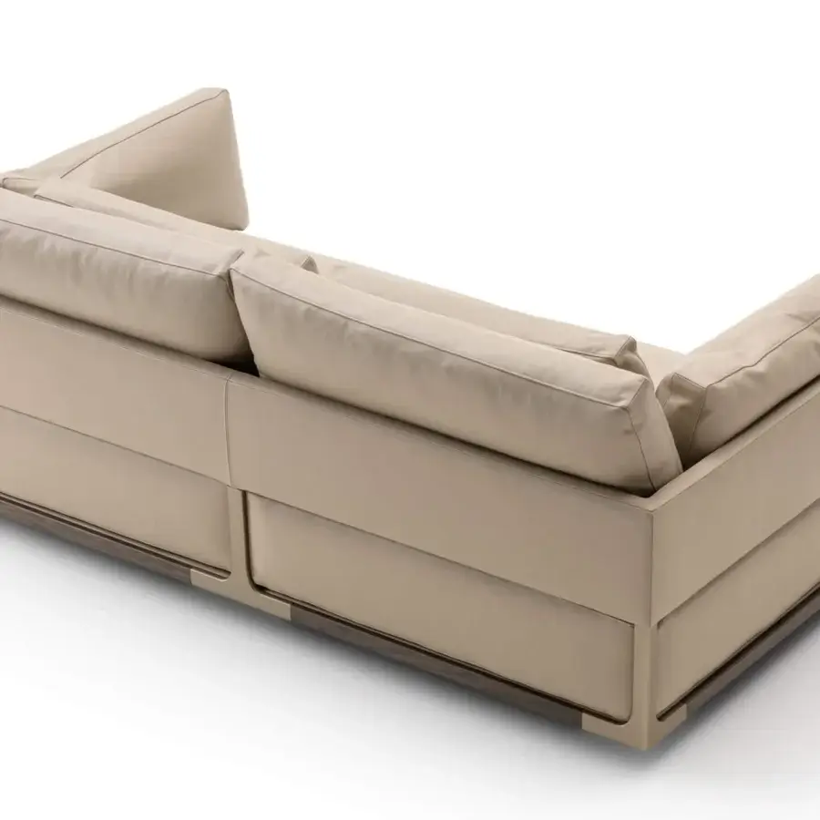 Distinguished Turri Drum sofa with walnut wood, metal details, and Italian beige leather upholstery, boasting a smooth finish