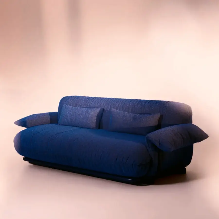 Distinguished Bolzan Letti Mate sofabed with textured dark blue textile upholstery and enveloping proportions including matching cushions