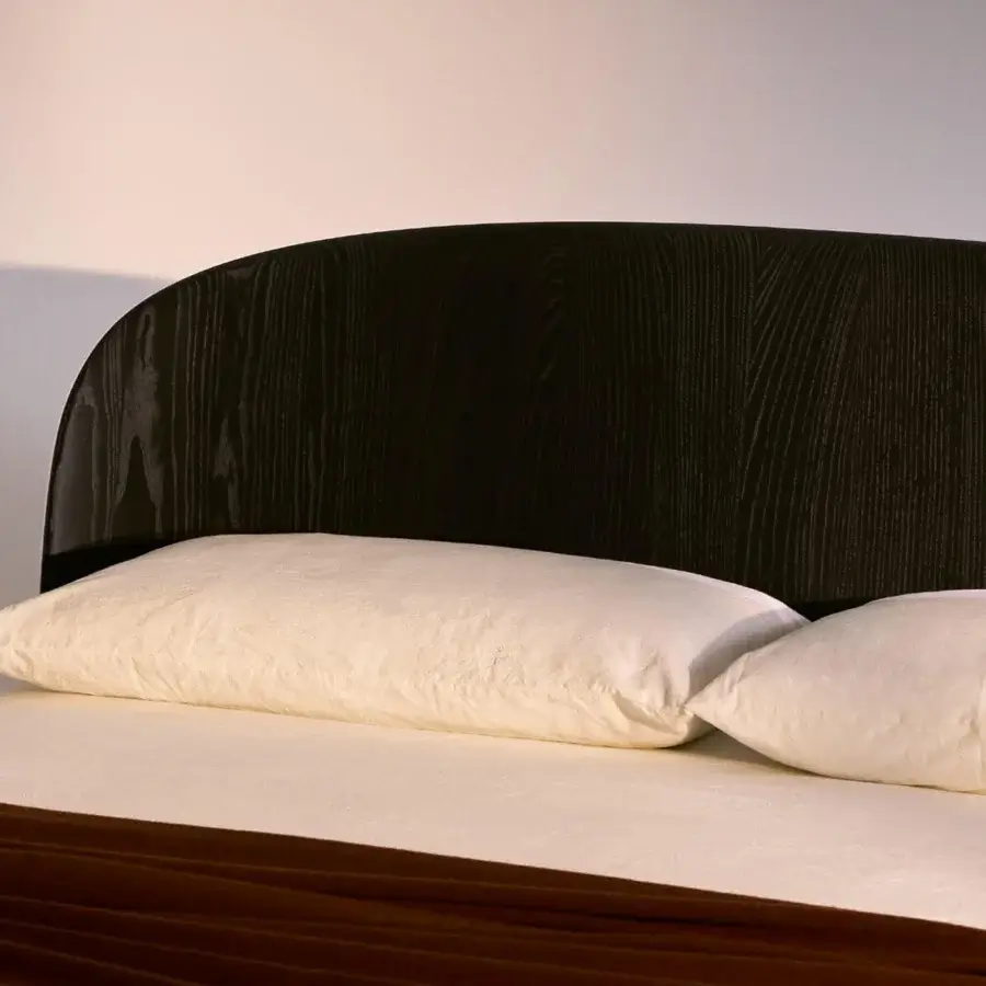 Superior Bolzan Letti Nest bed with ash wood construction and a glossy, dark brown headboard crafted with a slightly concave design