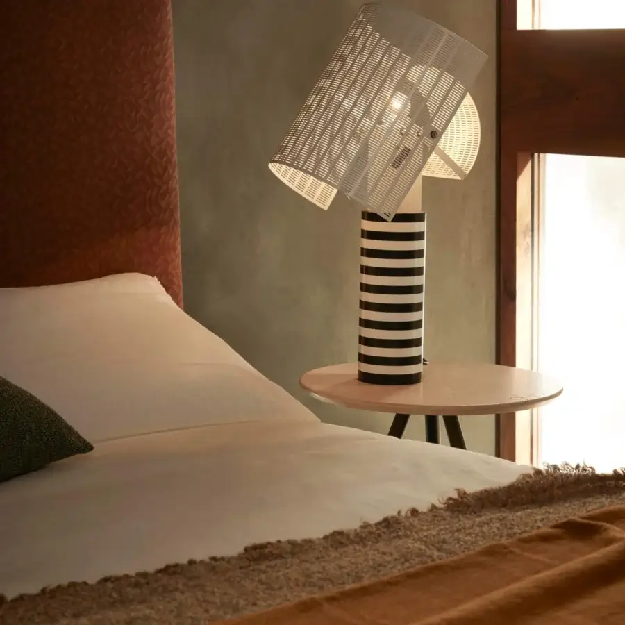 Distinguished Bolzan Letti Noah bed with reddish-brown textured textile and light-colored frame built with skilled Italian craftsmanship