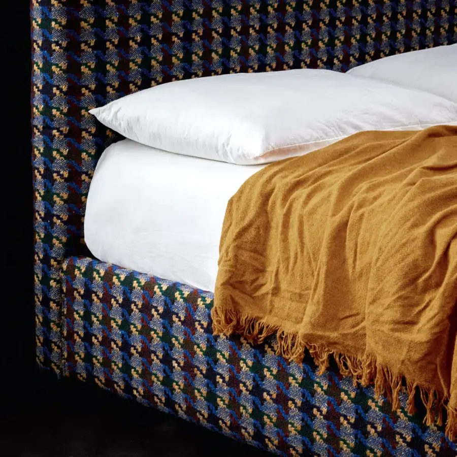 Exceptional Bolzan Letti Noah bed crafted in Italy with blue, brown, green, and gold tweed upholstery and a low-profile frame