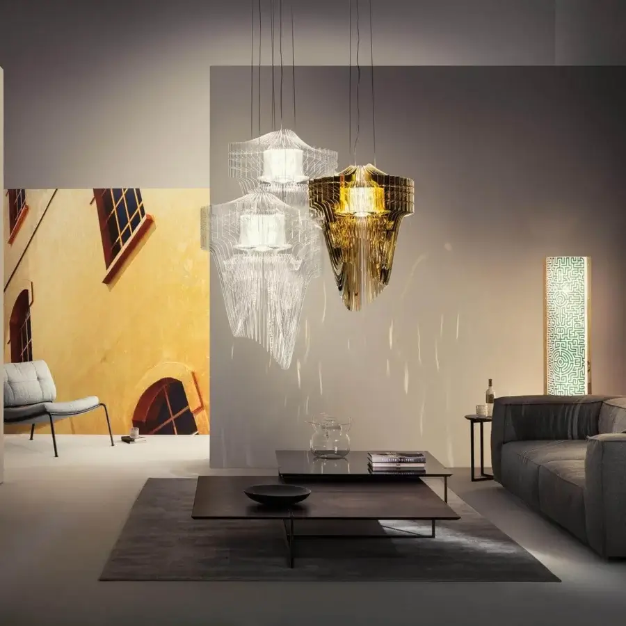 Distinguished Slamp Aria suspension lamp crafted in Cristalflex® with a golden tone and dynamic layered construction