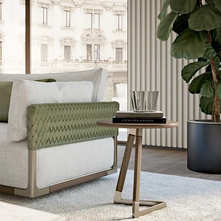 Elegant Turri Drum sectional with comfortable seat, woven green leather armrest and walnut wood structure crafted with metal details