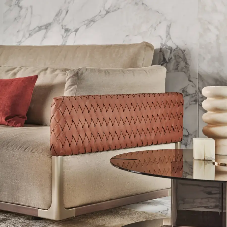 Distinguished Turri Drum sectional with neutral beige textile upholstery and woven light brown Italian leather side panels crafted in walnut wood