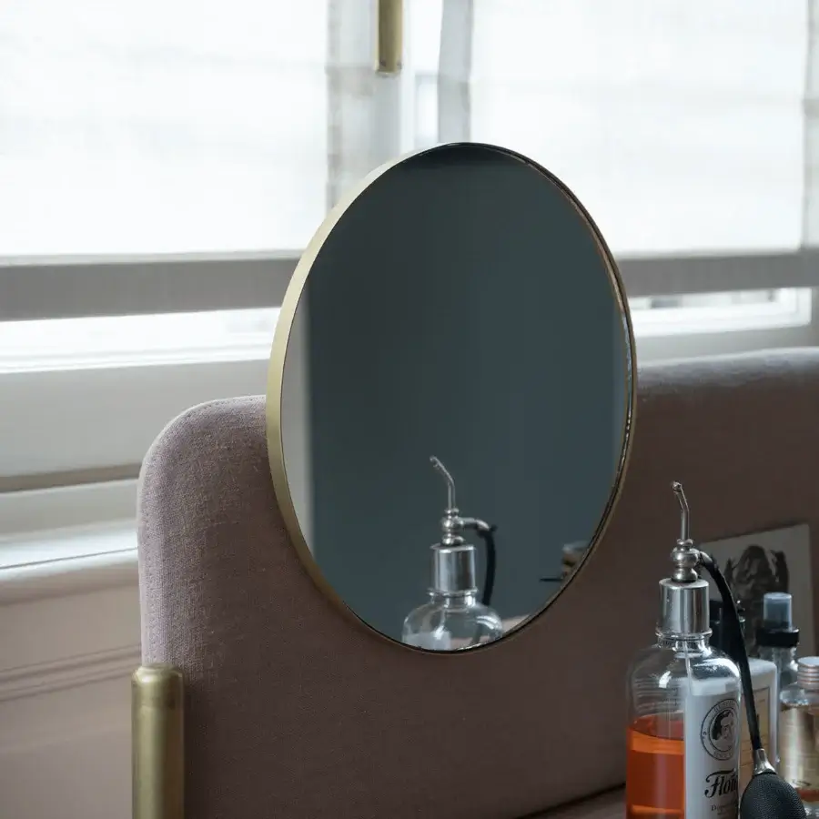 Elegant Bolzan Letti Flag vanity with canaletto walnut wood and light brown padded panel supported by golden metallic legs