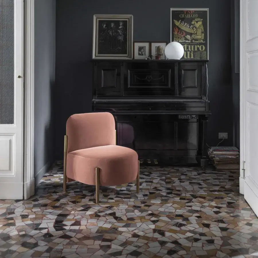 Elegant Bolzan Letti Flag lounge chair upholstered in muted salmon textile with glossy gold metal legs