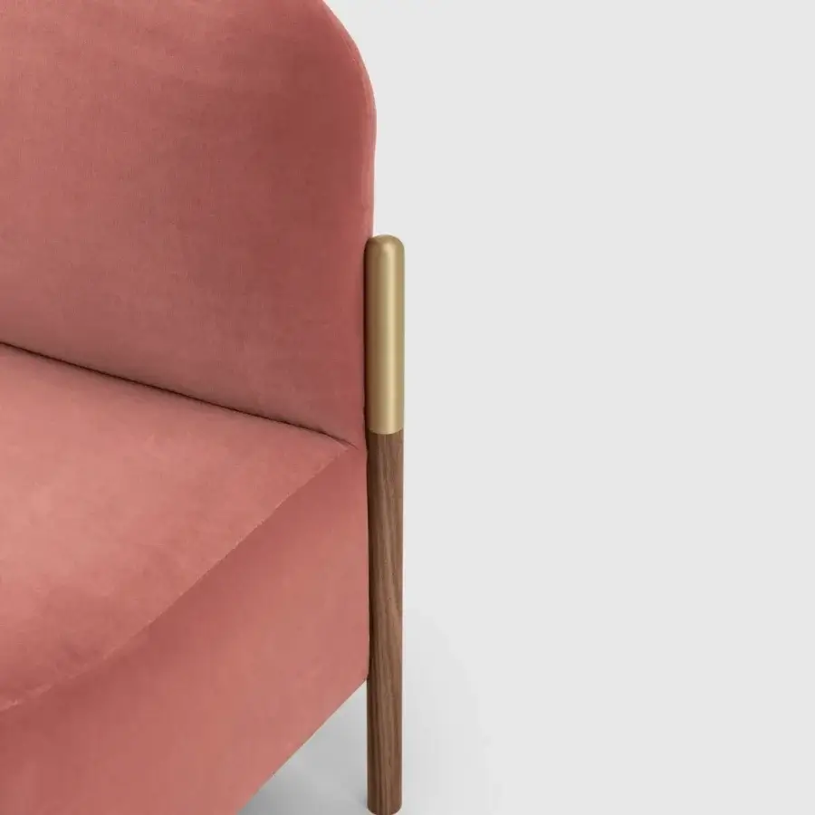 Distinguished Bolzan Letti Flag lounge chair upholstered in smooth salmon-coral textile with cylindrical gold metallic and dark matte wood leg