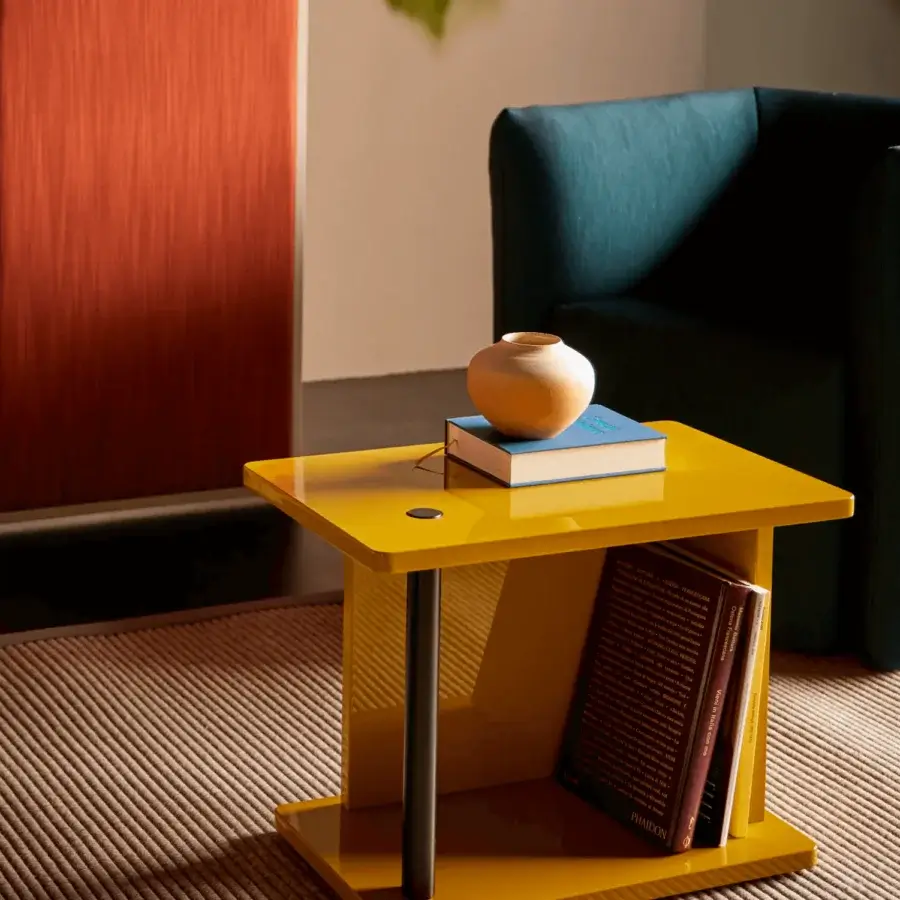 Sophisticated Bolzan Letti Dominic side table crafted in vibrant yellow lacquered HDF with cylindrical dark gray legs