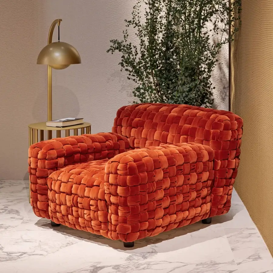Distinguished Turri Azul lounge chair with vibrant orange velvet upholstery and meticulous macro weave finish