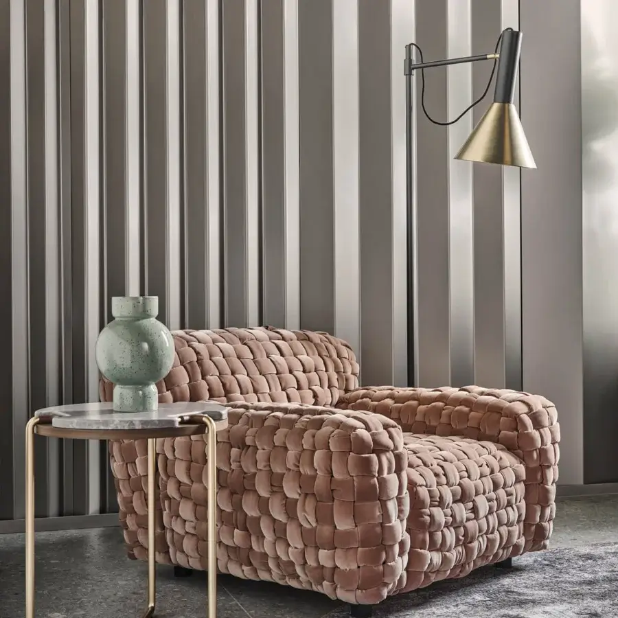 Exceptional Turri Azul lounge chair in muted rose velvet with distinctive macro weave and matte finish