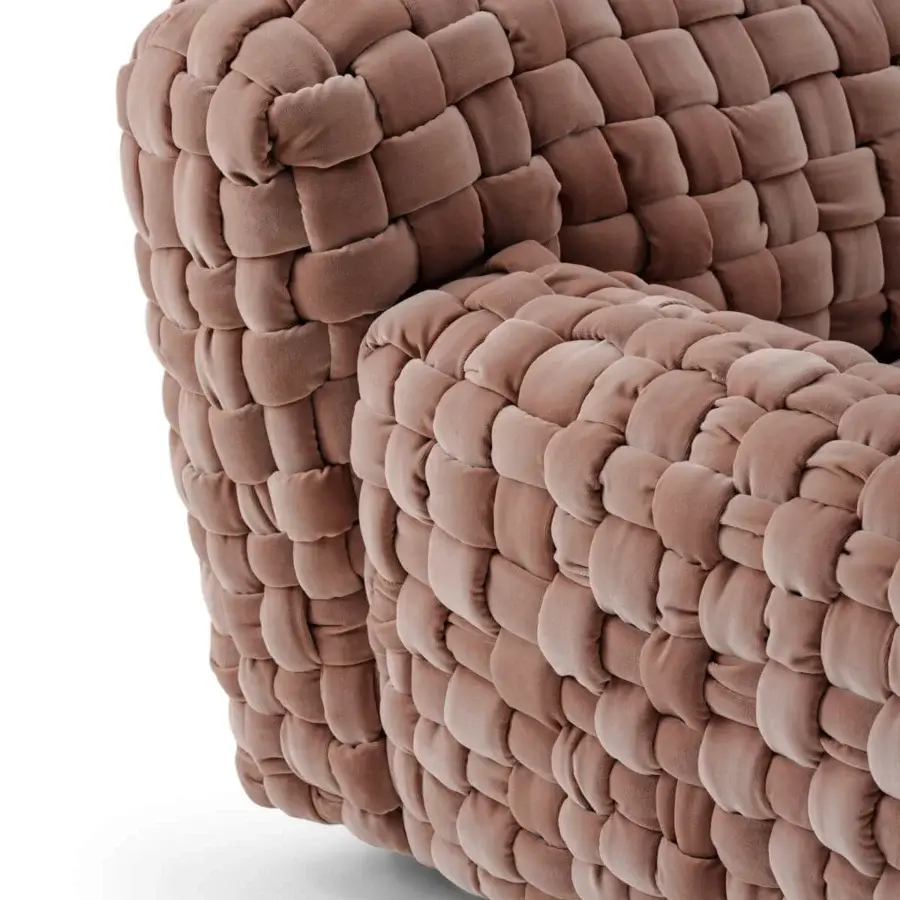 Lavish Turri Azul lounge chair with a macro weave and soft textural variations in dusty rose velvet crafting