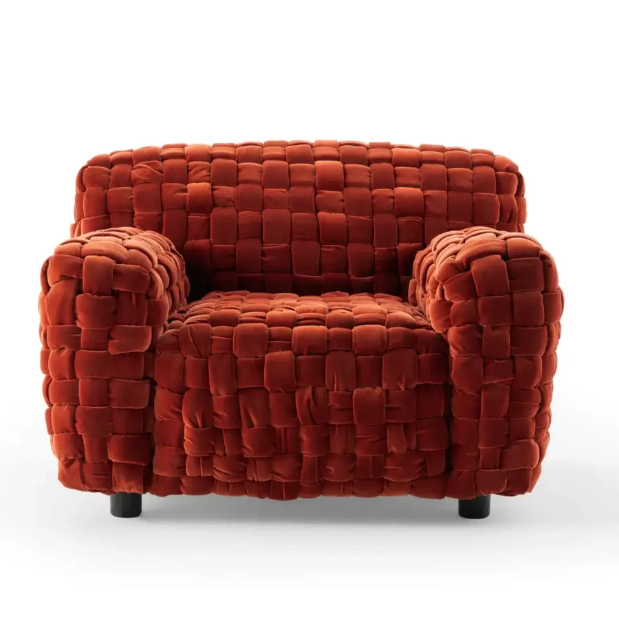 Lavish Turri Azul lounge chair with hand-woven reddish-brown velvet and short black cylindrical legs