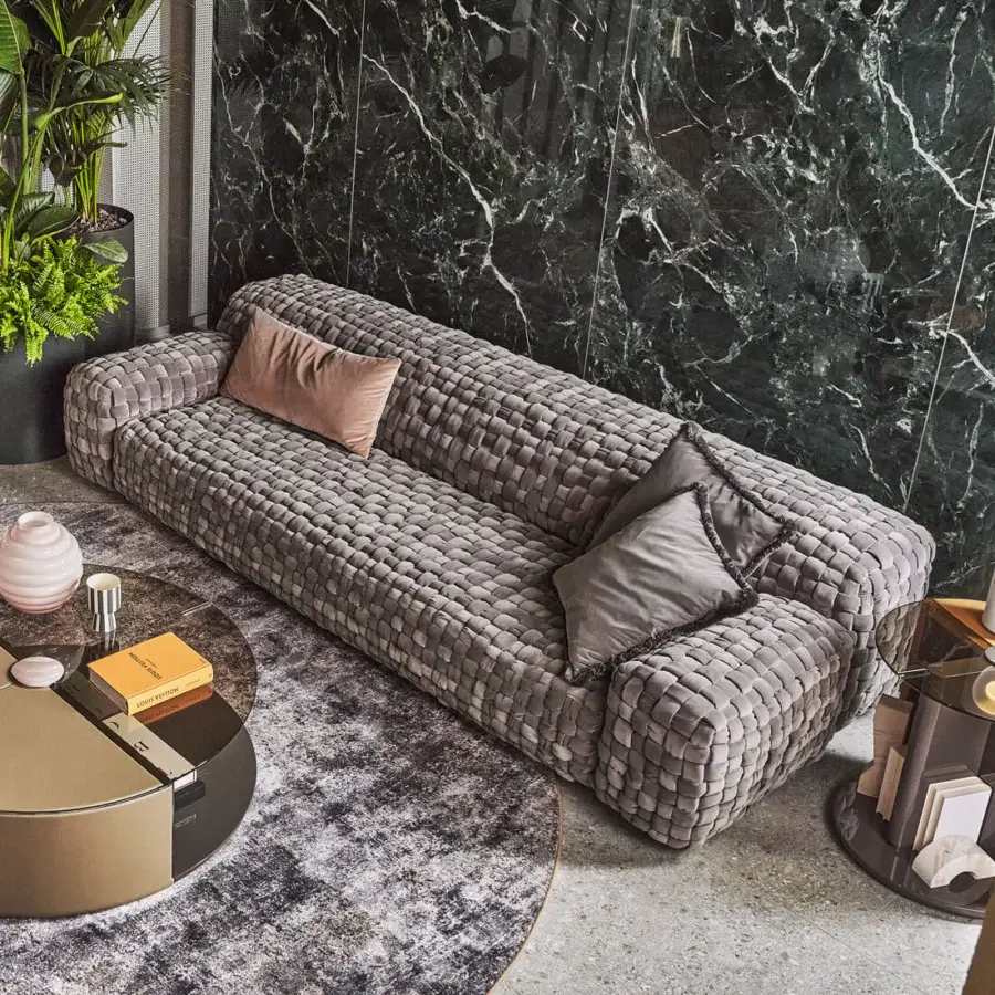 Distinguished Turri Azul sofa crafted in medium gray velvet with a macro weave and fringed dark gray cushions