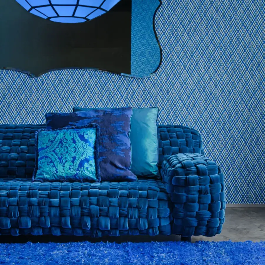 Distinguished Turri Azul sofa crafted in deep blue velvet with a meticulous macro weave and integrated armrests