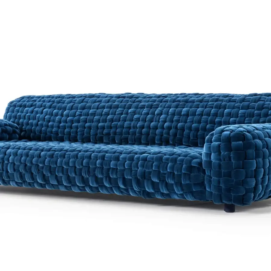 Superior Turri Azul sofa presents a captivating macro weave in elegant blue velvet, handmade in Italy with rounded geometric forms