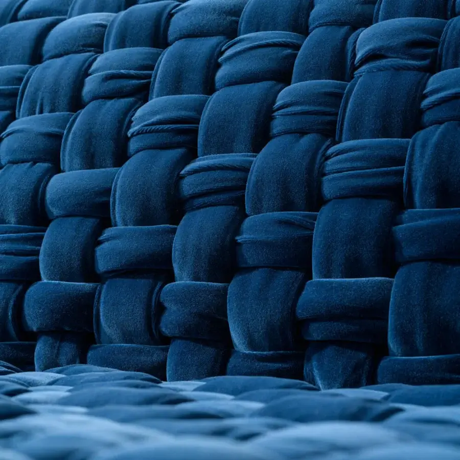Superior Turri Azul sofa showcases a contemporary silhouette crafted with plush blue velvet and meticulous macro weave