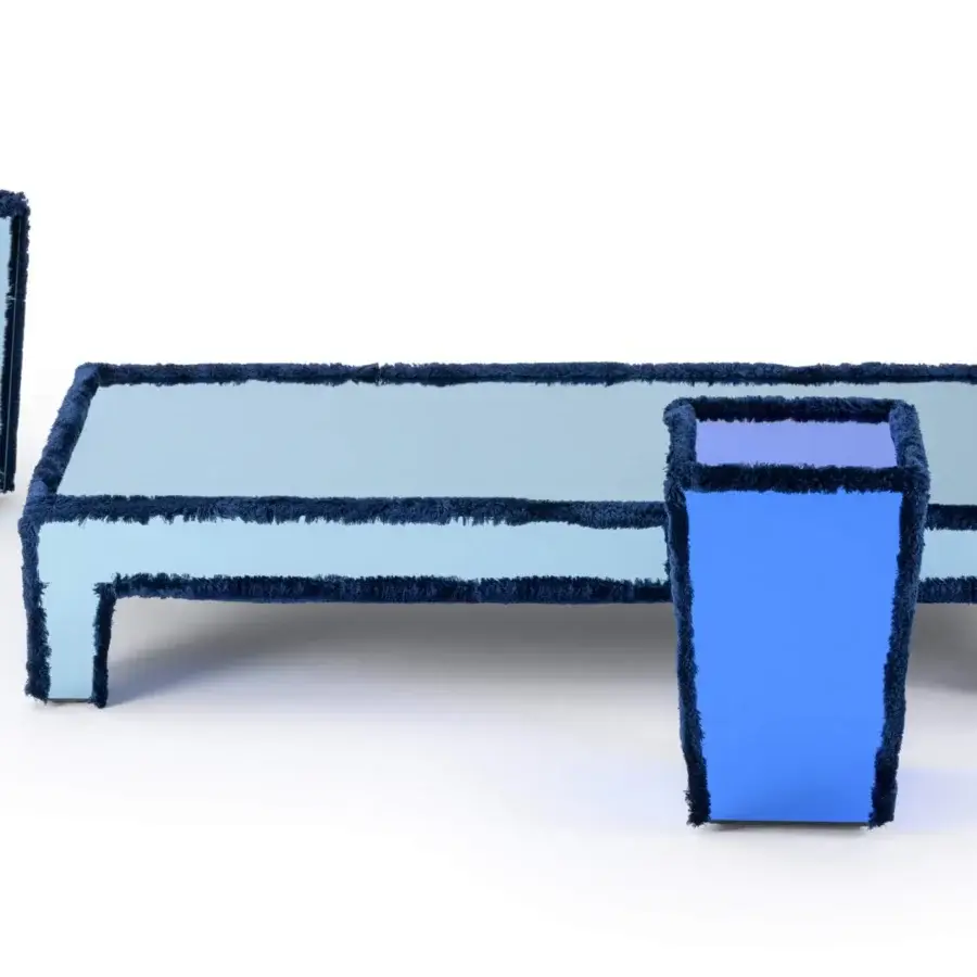 Distinctive Turri Azul coffee table with a reflective light blue surface and unique fringe piping detail