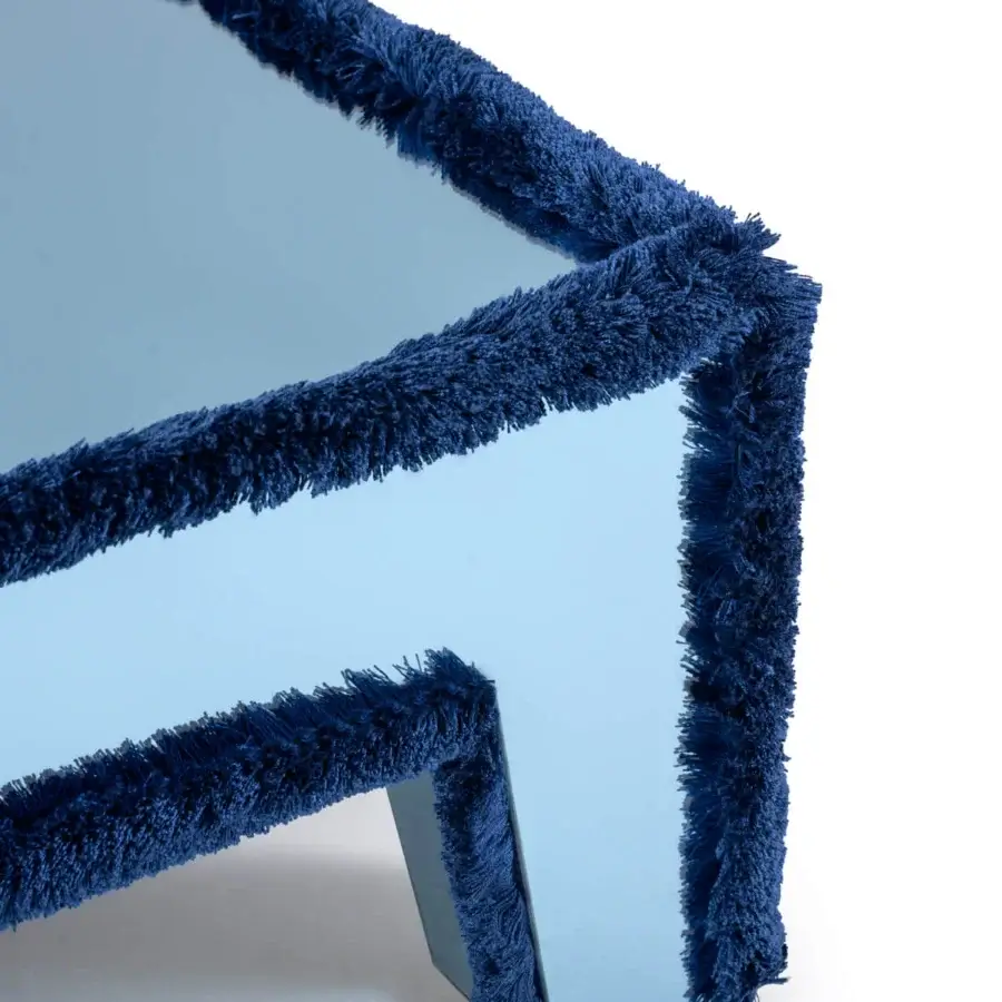 Elegant Turri Azul coffee table with geometric lines and a glossy light blue finish complemented by dark blue textile trim
