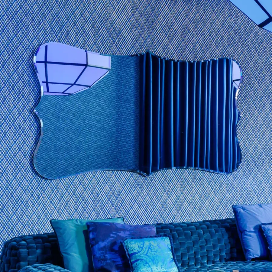 Superior Turri Azul mirror with organic silhouette and beveled blue reflective glass crafted in fluted fabric-like elements with textured matte finish