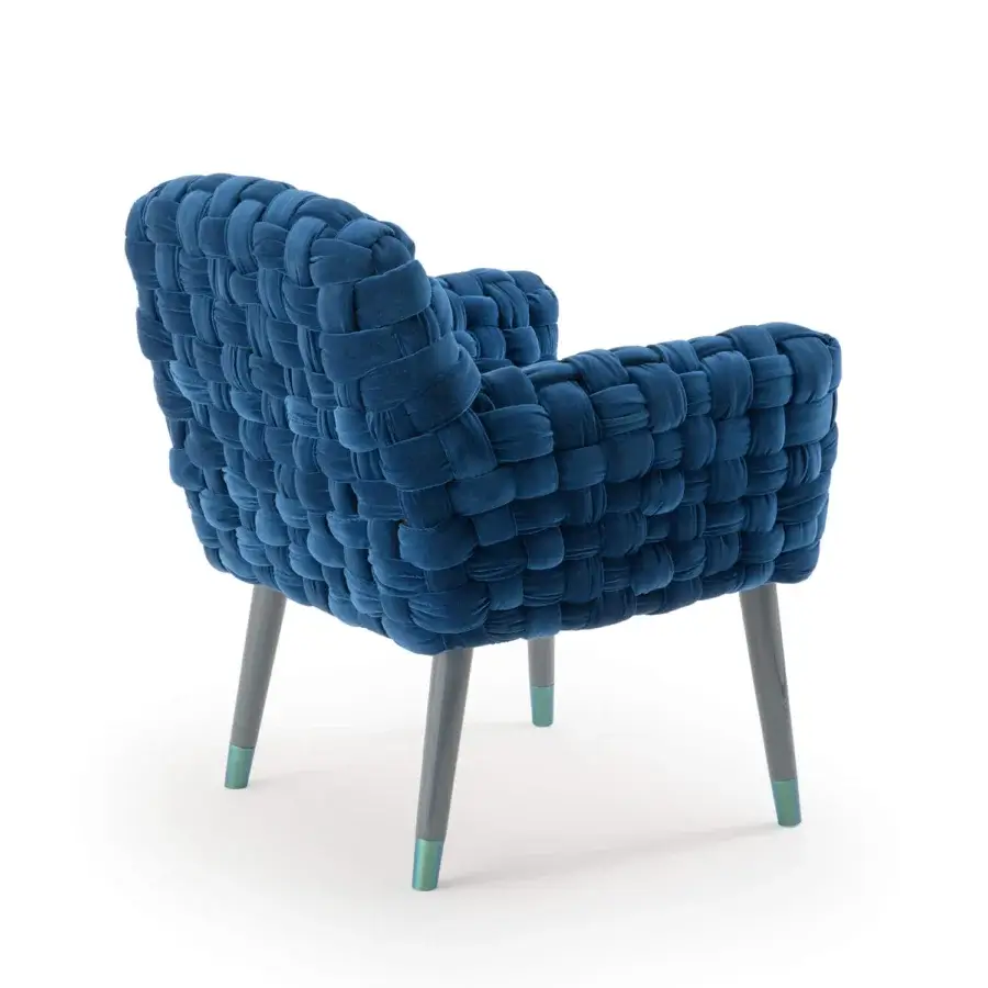 Elegant Turri Azul armchair upholstered in deep blue macro weave velvet with glossy lacquered wooden legs