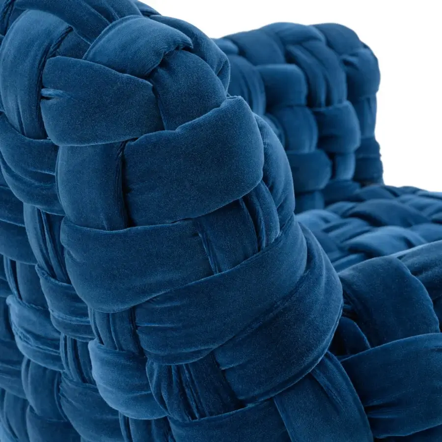 Superior Turri Azul armchair showcasing plush blue velvet with a macro weave and glossy monochrome lacquered polyester legs