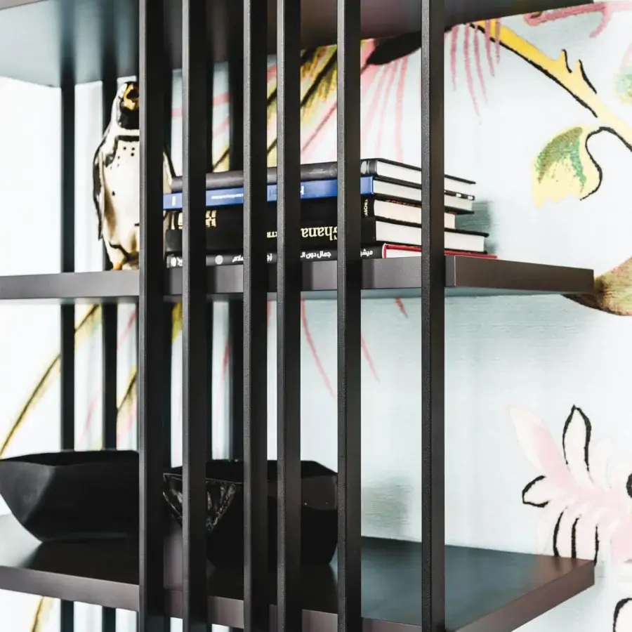 Distinguished Cattelan Italia Arsenal bookcase with an embossed graphite lacquered steel frame and matching graphite painted wood shelving