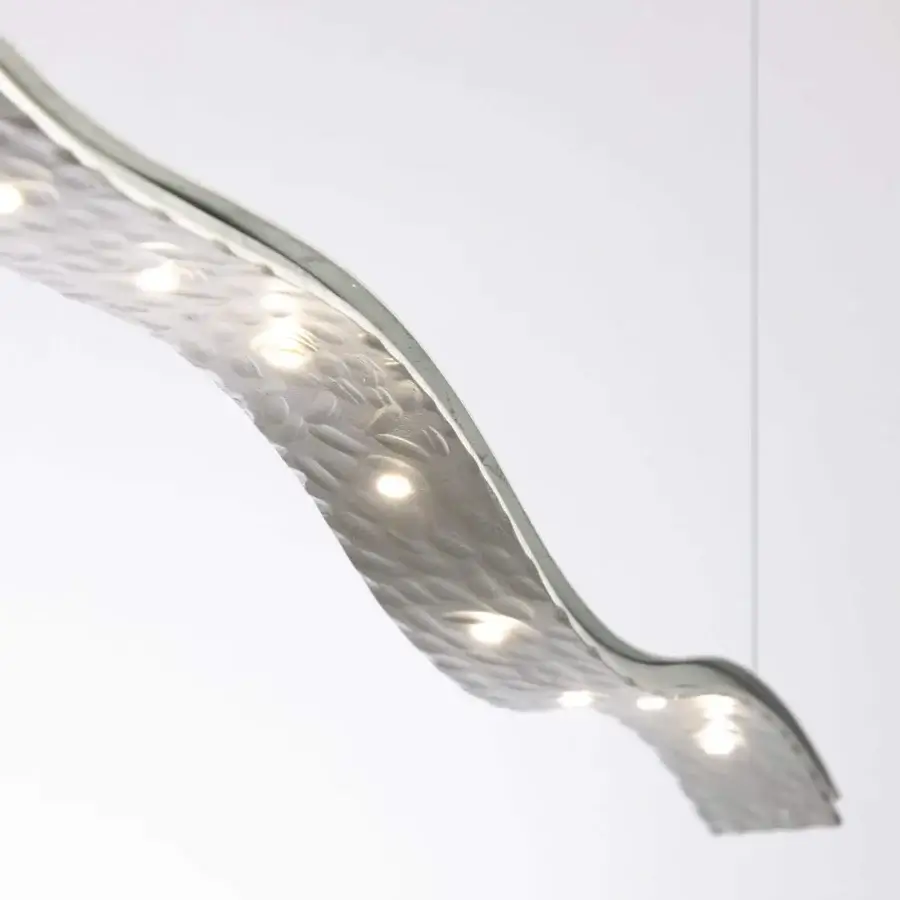 Superior Stillux Swing suspension lamp crafted in hammered metal with polished edges and enveloping diffused LED light sources