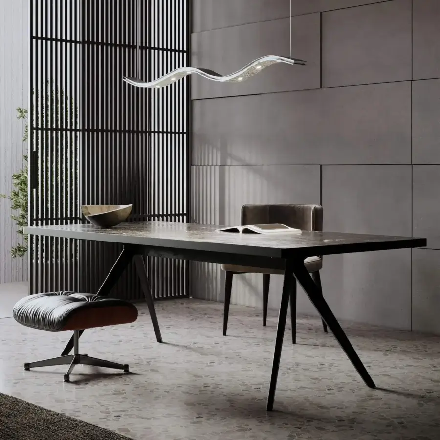 Exclusive Stillux Swing suspension lamp crafted in hammered metal with glossy reflective silver finish