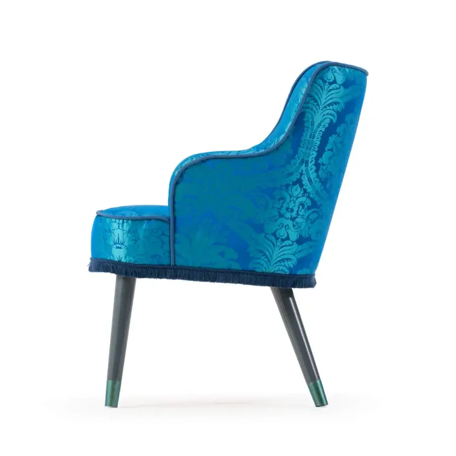 Exclusive Turri Azul armchair with bright blue floral textile, dark blue fringe and glossy dark grey lacquered wooden legs with metallic green caps