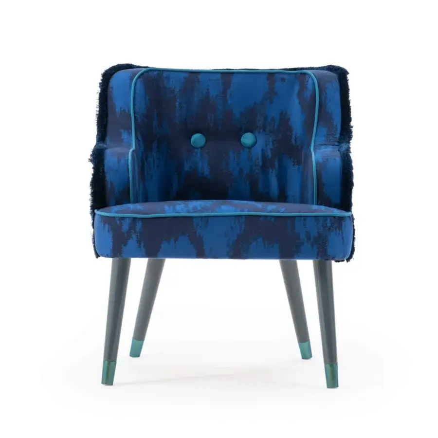 Superior Turri Azul armchair in textured blue patterned fabric with fringe and glossy monochrome lacquered polyester legs