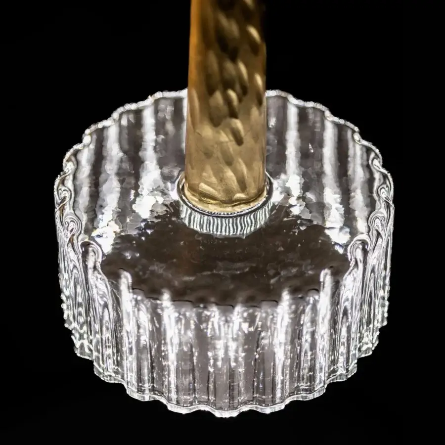 Distinguished Stillux Median suspension lamp with golden hammered metal and clear scalloped crystal base crafted in Italy
