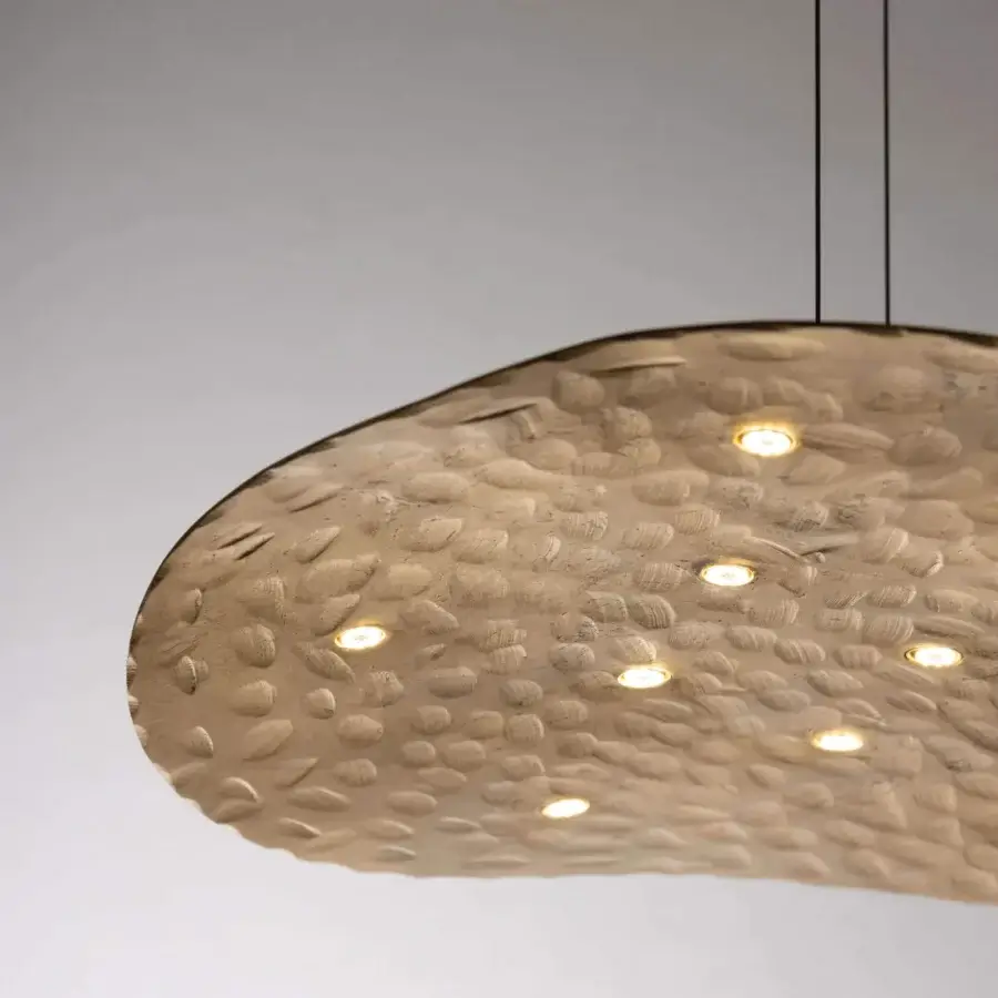 Elegant Stillux Flat suspension lamp crafted in warm beige hammered metal with integrated round light fixtures
