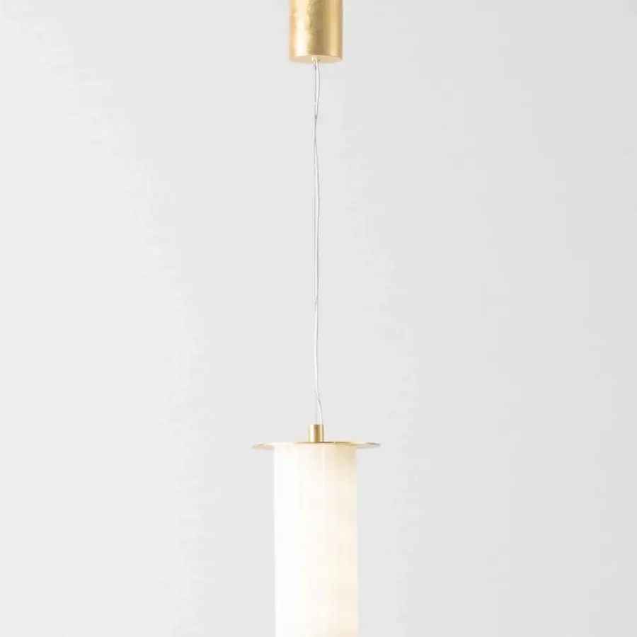 Lavish Stillux Overlay suspension lamp with gold-colored metal disks and matt white channeled glass diffuser crafted in Italy