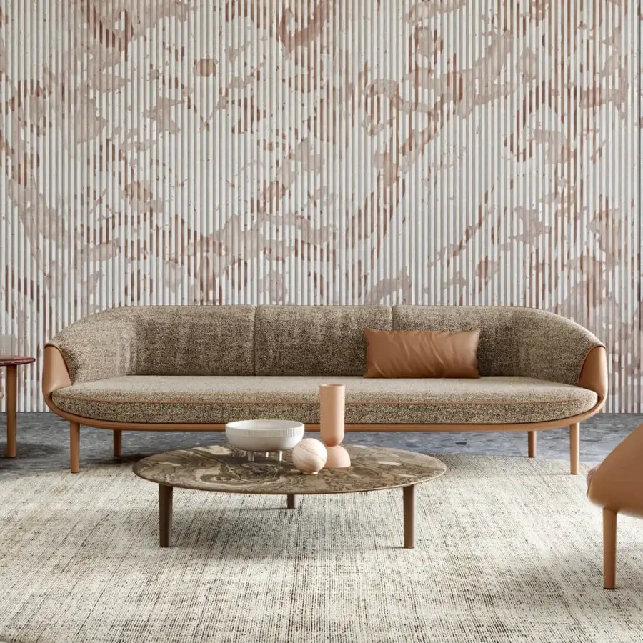 Distinguished Turri Riban sofa crafted in leather with textured brown textile upholstery and light brown trim