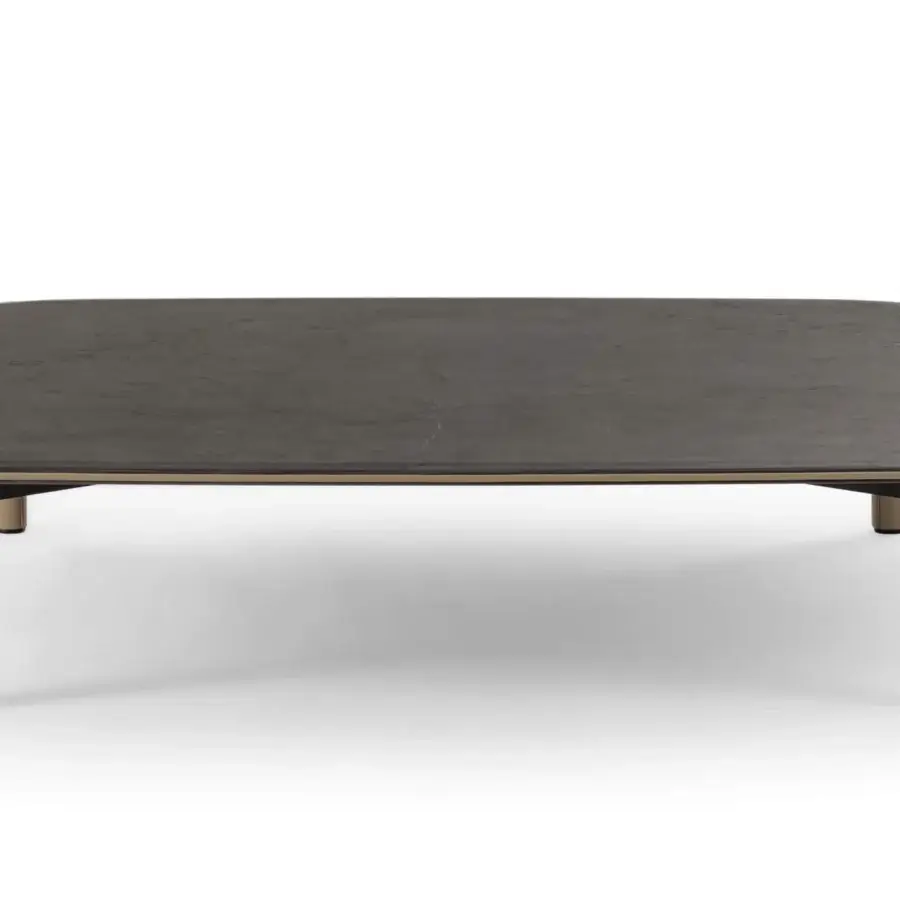 Superior Turri Riban coffee table with rounded lines, dark matte top and light tan leather-covered cylindrical legs